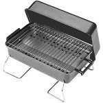 A small portable grill with a lid on a white background.