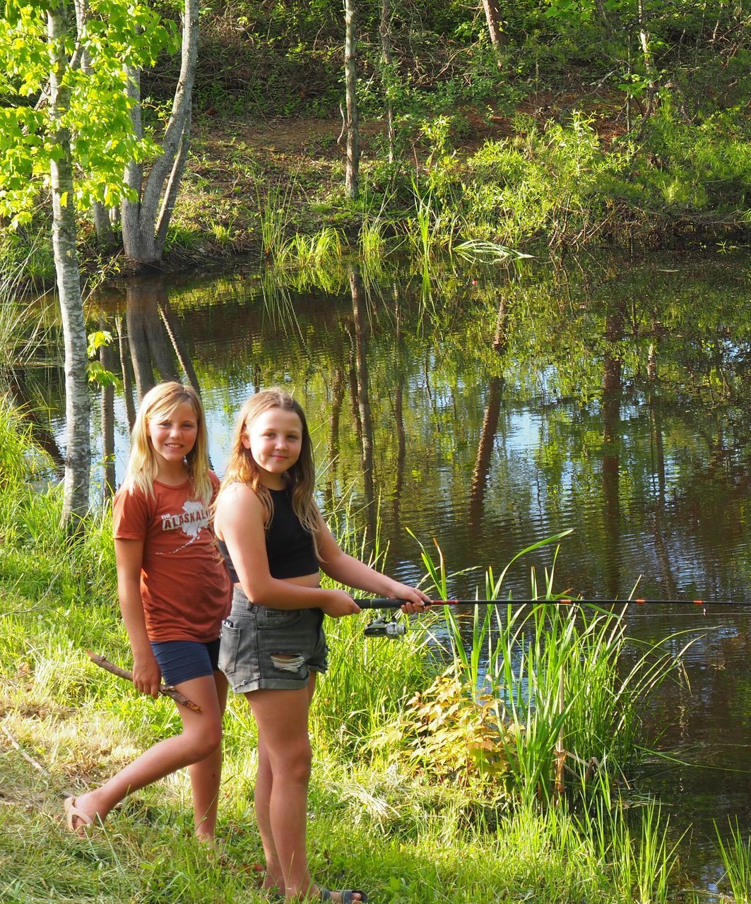 Kids fishing in pond at Firefly Hills in Eastern Kentucky