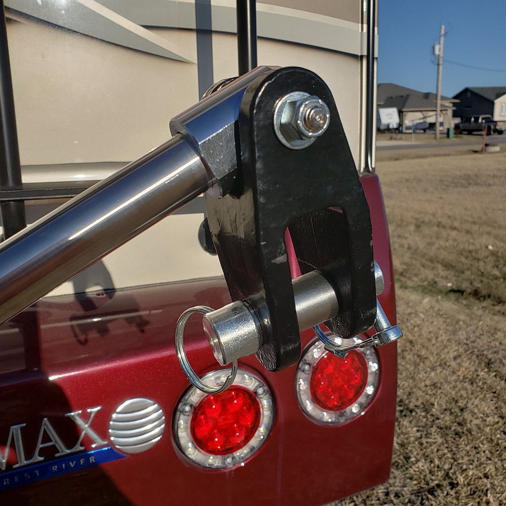 A red truck with the word max on the back