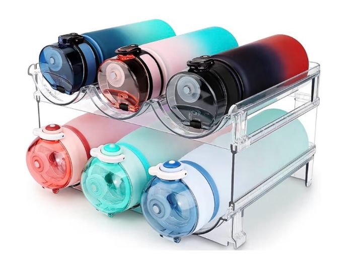 Clear plastic water bottle rack holding six colorful gradient water bottles.