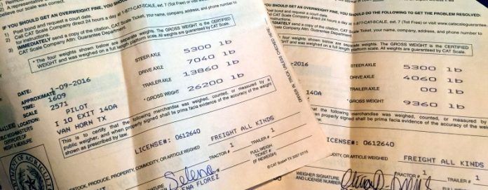 Paper documents with handwritten and typed text, including weight information.
