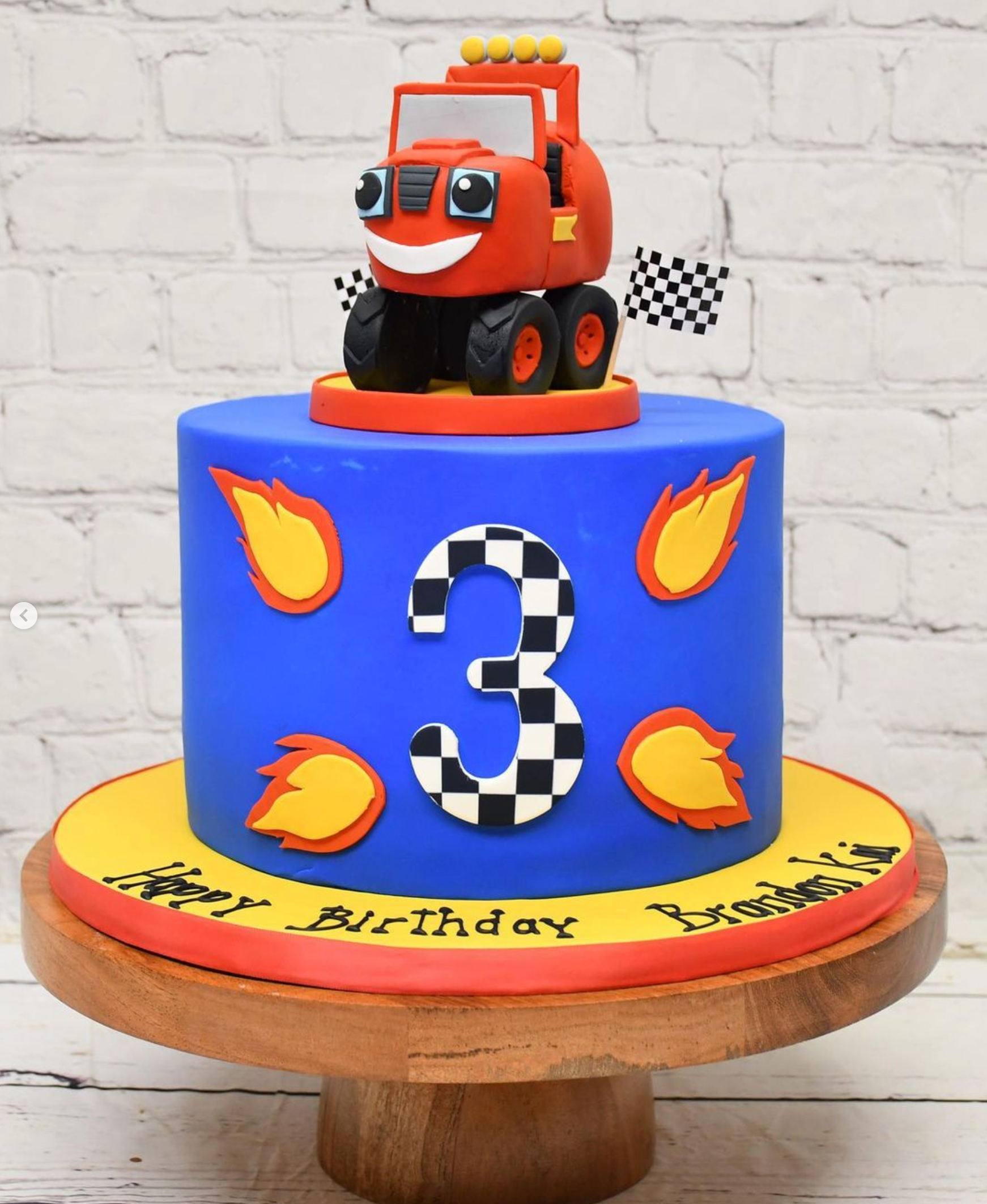 Blaze the monster truck birthday cake with the number 3 on it