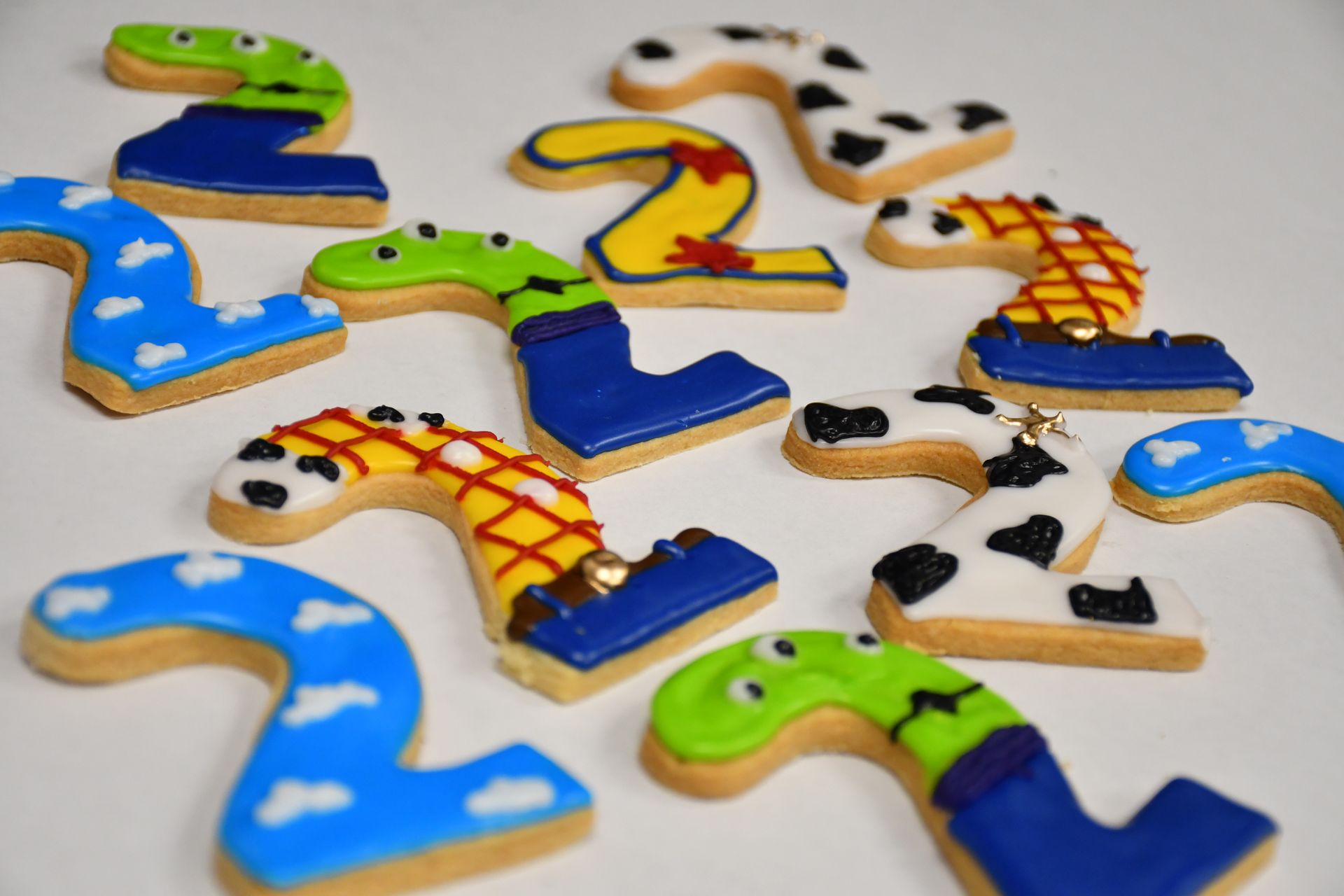 A bunch of cookies in the shape of the number 2