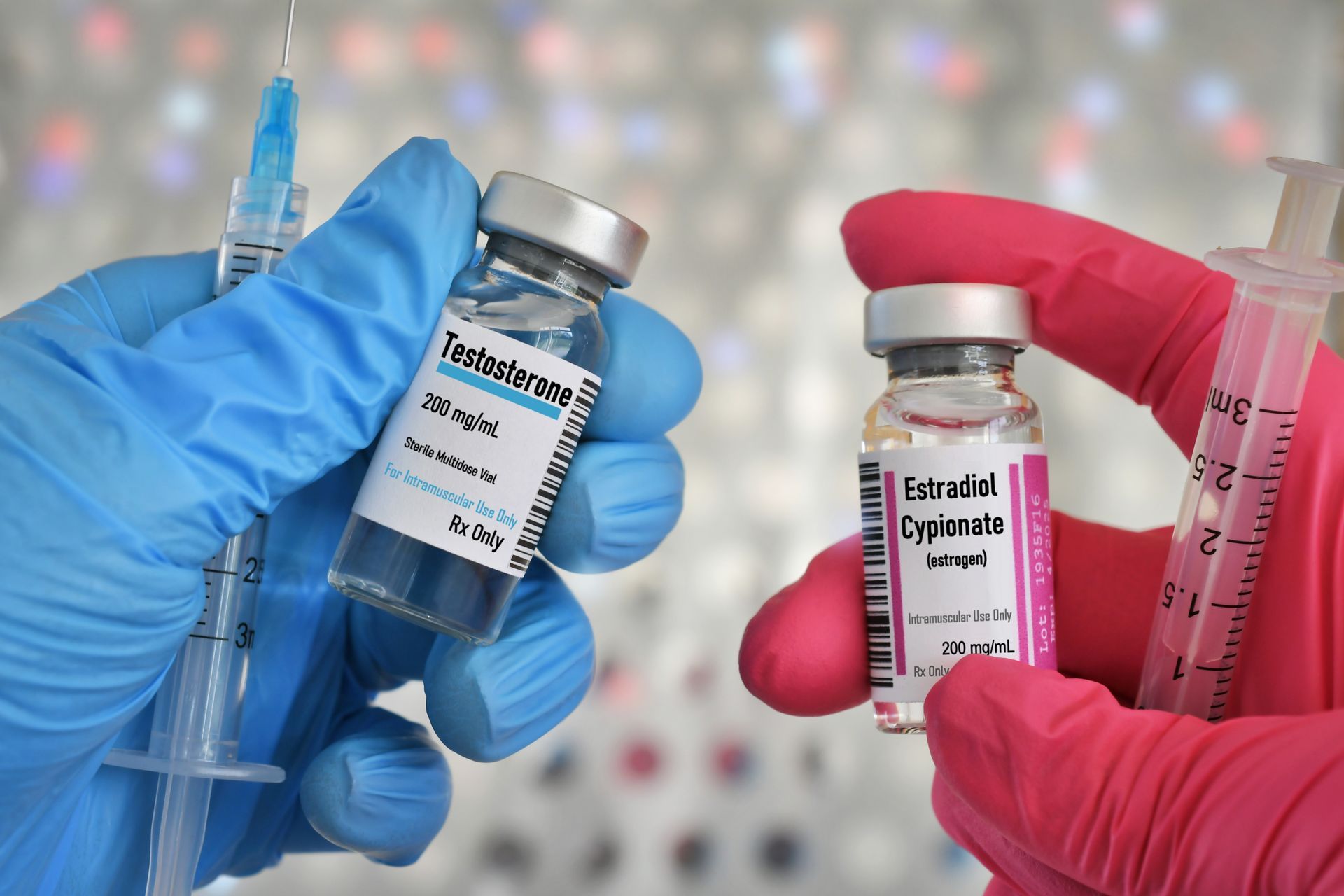 Hormone therapy injections - vials of testosterone male and estrogen aka estradiol cypionate female hormones for treatment.