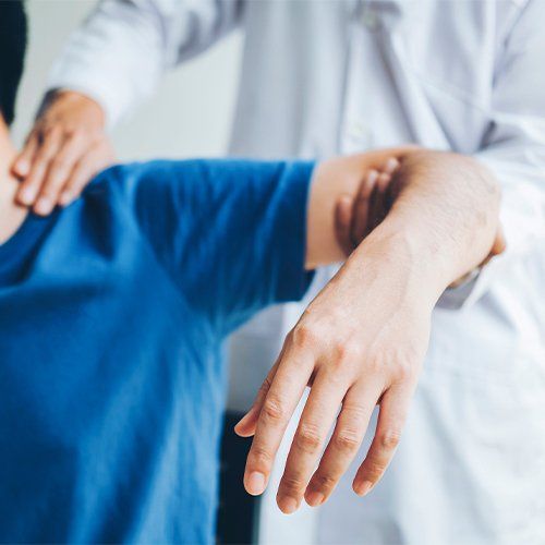 Supporting his Arms  — Clearwater, FL — Pain Care Management
