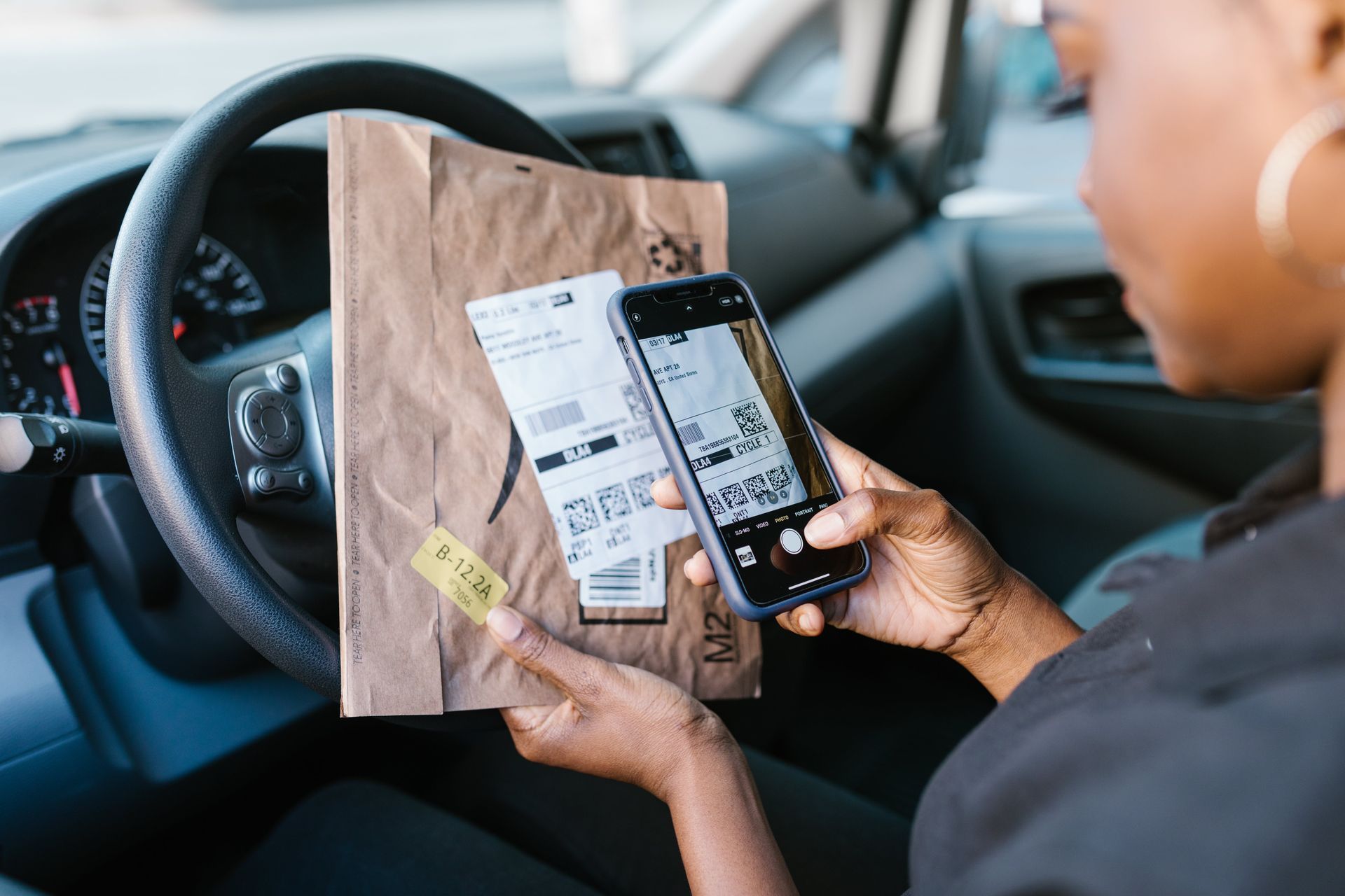 delivery man with small parcel- Parcel Delivery in Darwin, NT