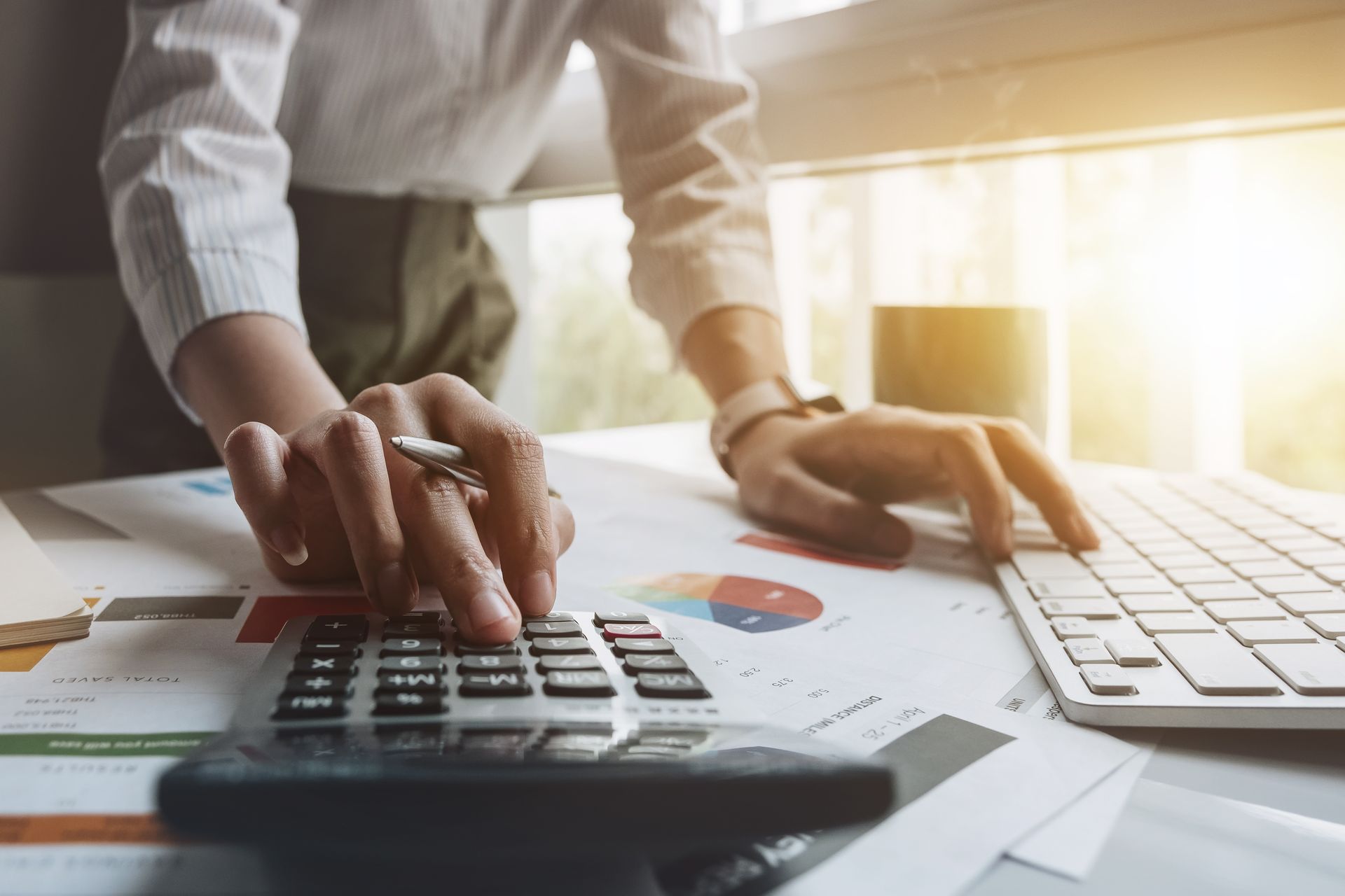 Certified public accountant in Haines City, FL meeting with a client to review finances