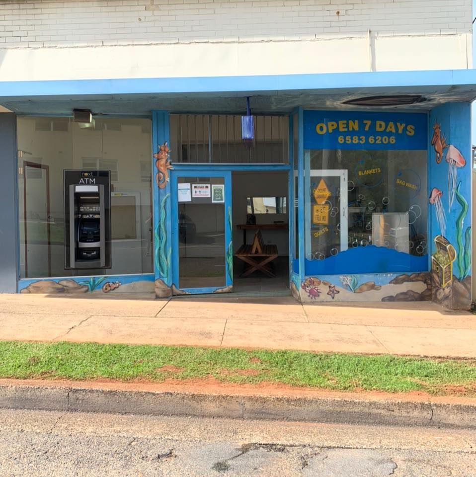 Painted Ocean-themed Mural on the Right-hand Window — Flynns Beach Service Laundry in Port Macquarie, NSW