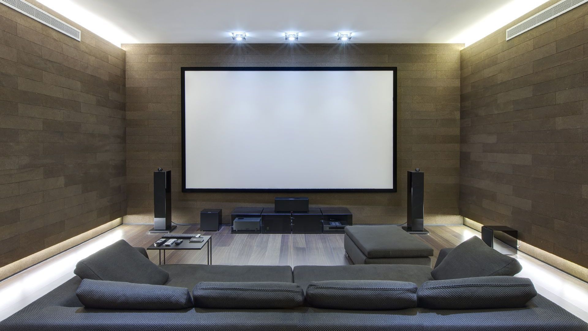 A technician installing home theater