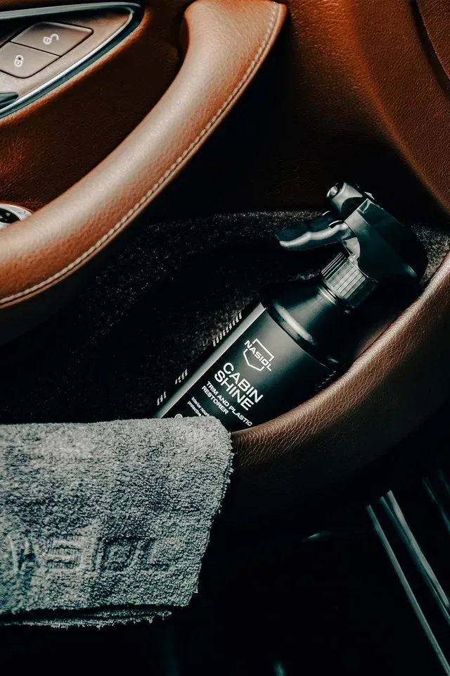 A black spray bottle of