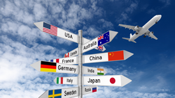Globe with location pins and an airplane tracing a dotted travel route