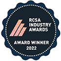 RCSA Industry Awards badge: dark blue, white dotted border, pink angled lines,