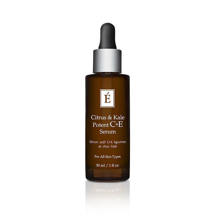 A bottle of citrus and kale potent che serum on a white background.