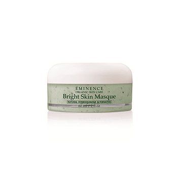 Eminence organic skin care bright skin masque is a green jar with a white lid.
