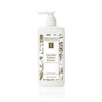 A bottle of eminence clear skin probiotic cleanser on a white background.