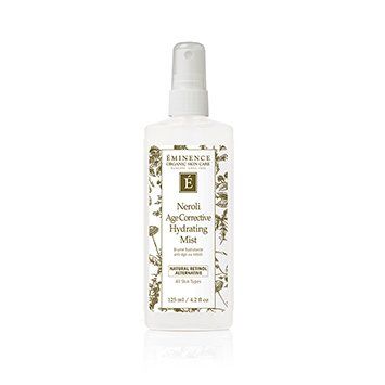 A bottle of neroli age corrective hydrating mist on a white background.