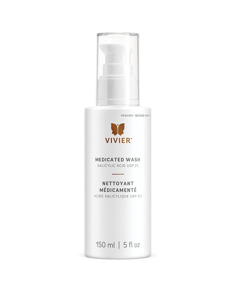 A white bottle of vivier dedicated wash is on a white background.