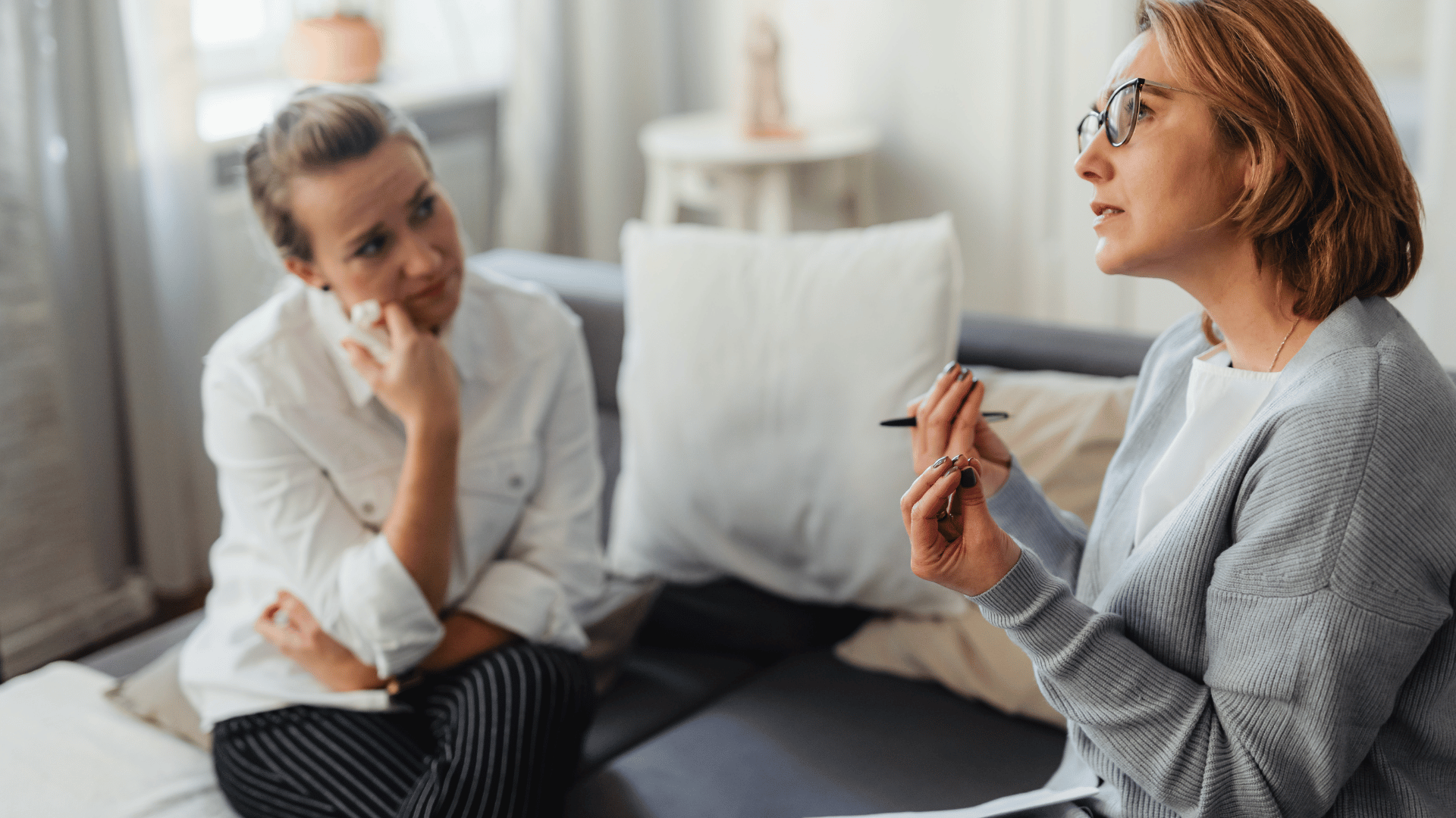Professional life coaching services with a life coach helping clients gain clarity, set goals, and create a personal growth plan