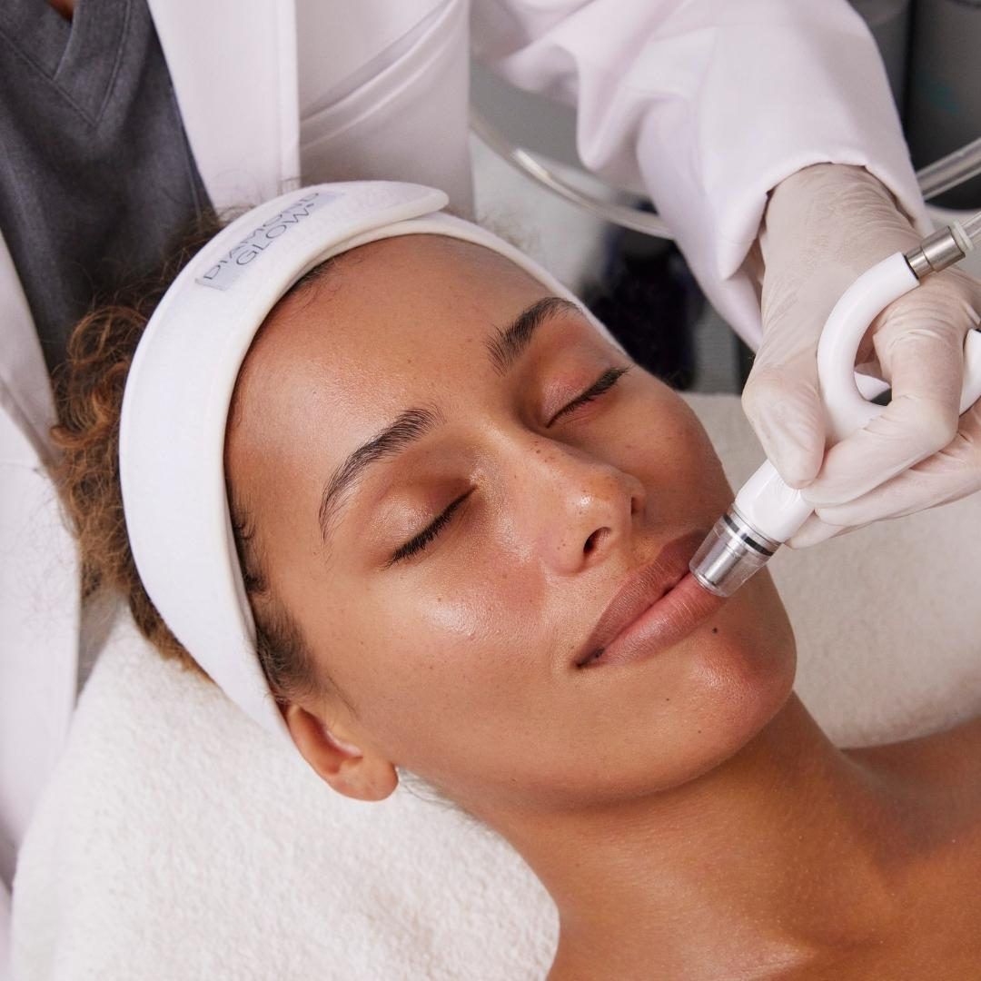 female patient receives DiamondGlow treatment on lips