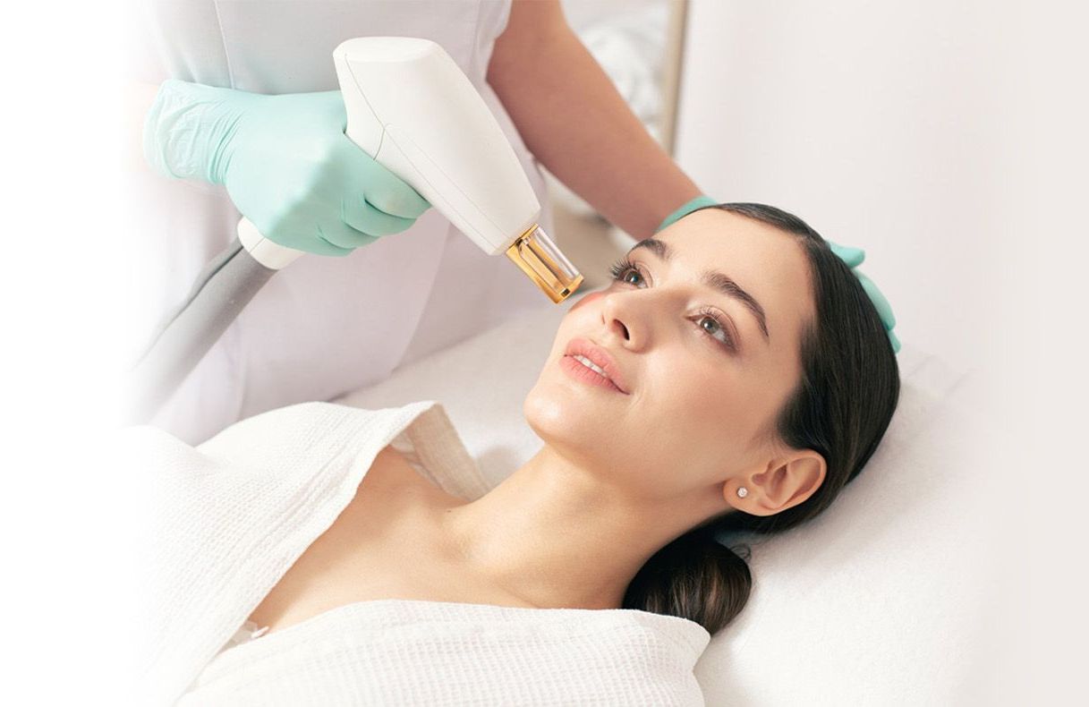 female skincare model showing bare underarm after laser hair removal