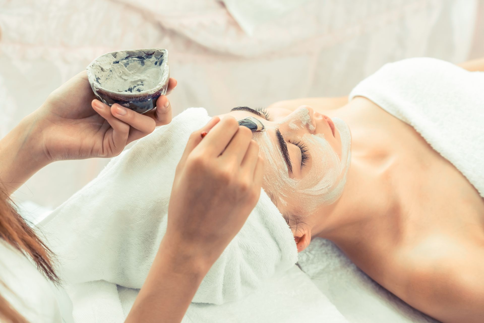 Beautiful Woman Having A Facial Cosmetic Scrub Treatment – Terrigal, NSW - Anjule Beauty Therapy