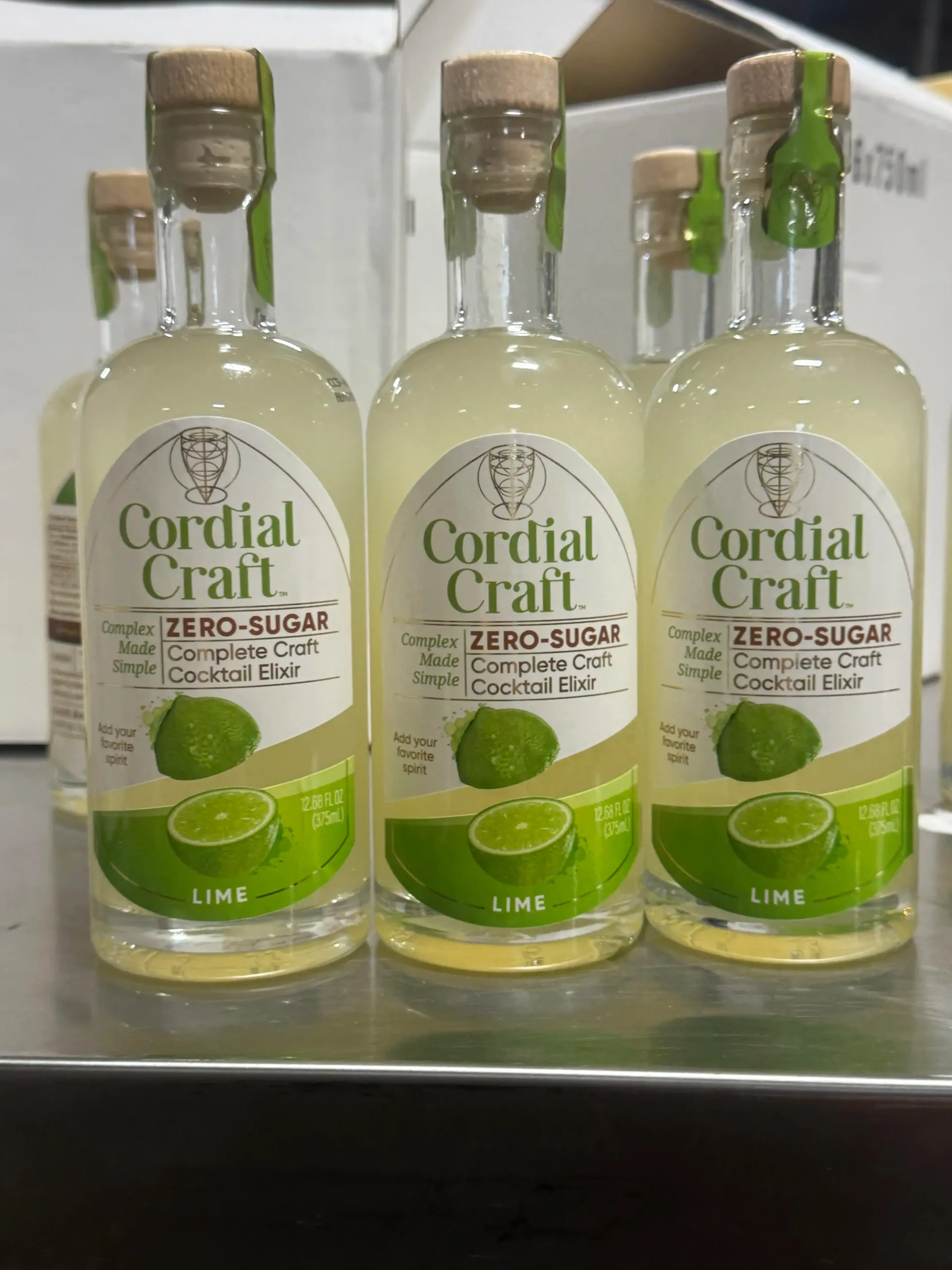 Three bottles of Cordial Craft Zero-Sugar Lime Cordial from the updated production batch