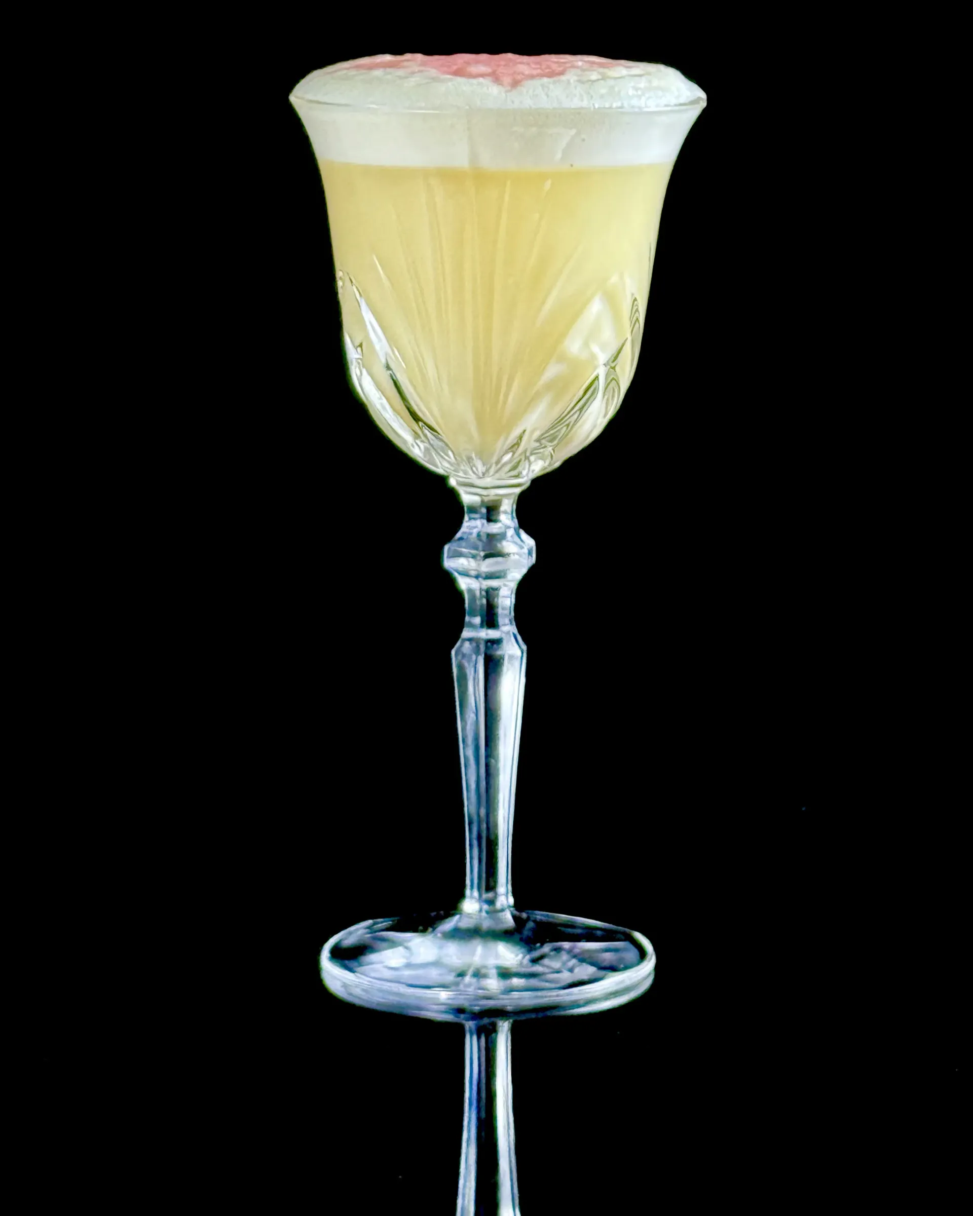 Earl Grey MarTEAni, an Earl Grey-infused gin sour with soft foam and layered citrus aromatics