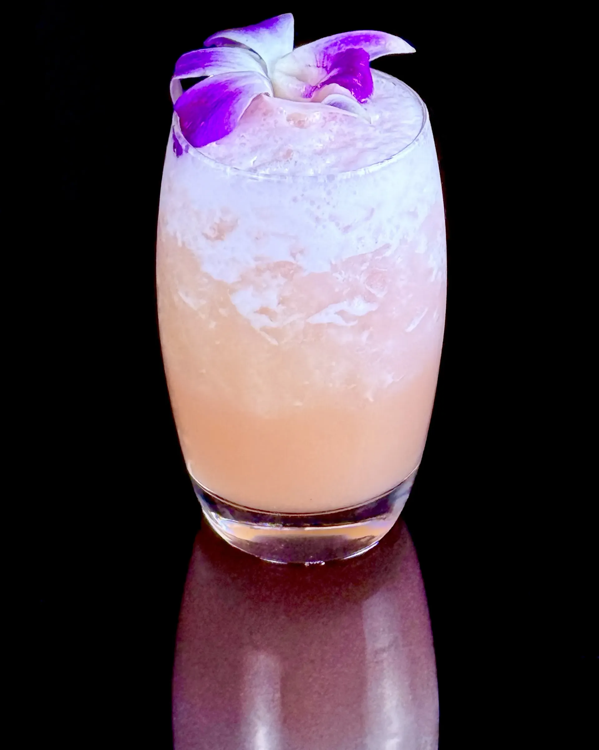 Skinny Humuhumu, a gin-tiki pineapple and almond drink with Peychaud’s bitters and a mound of crushed ice