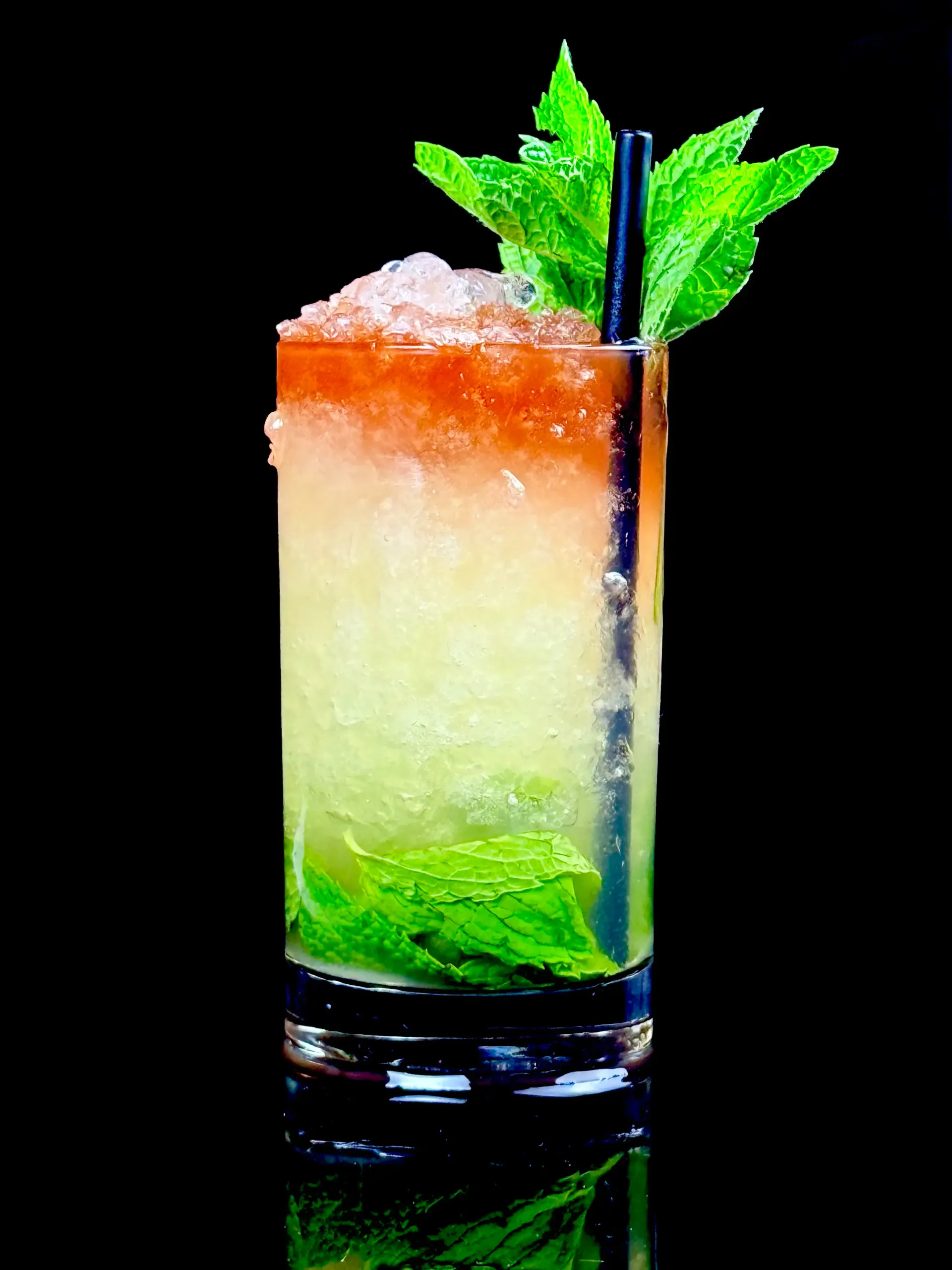 Queen’s Park Remix, a dark-rum mint cooler accented with aromatic bitters and served tall over ice