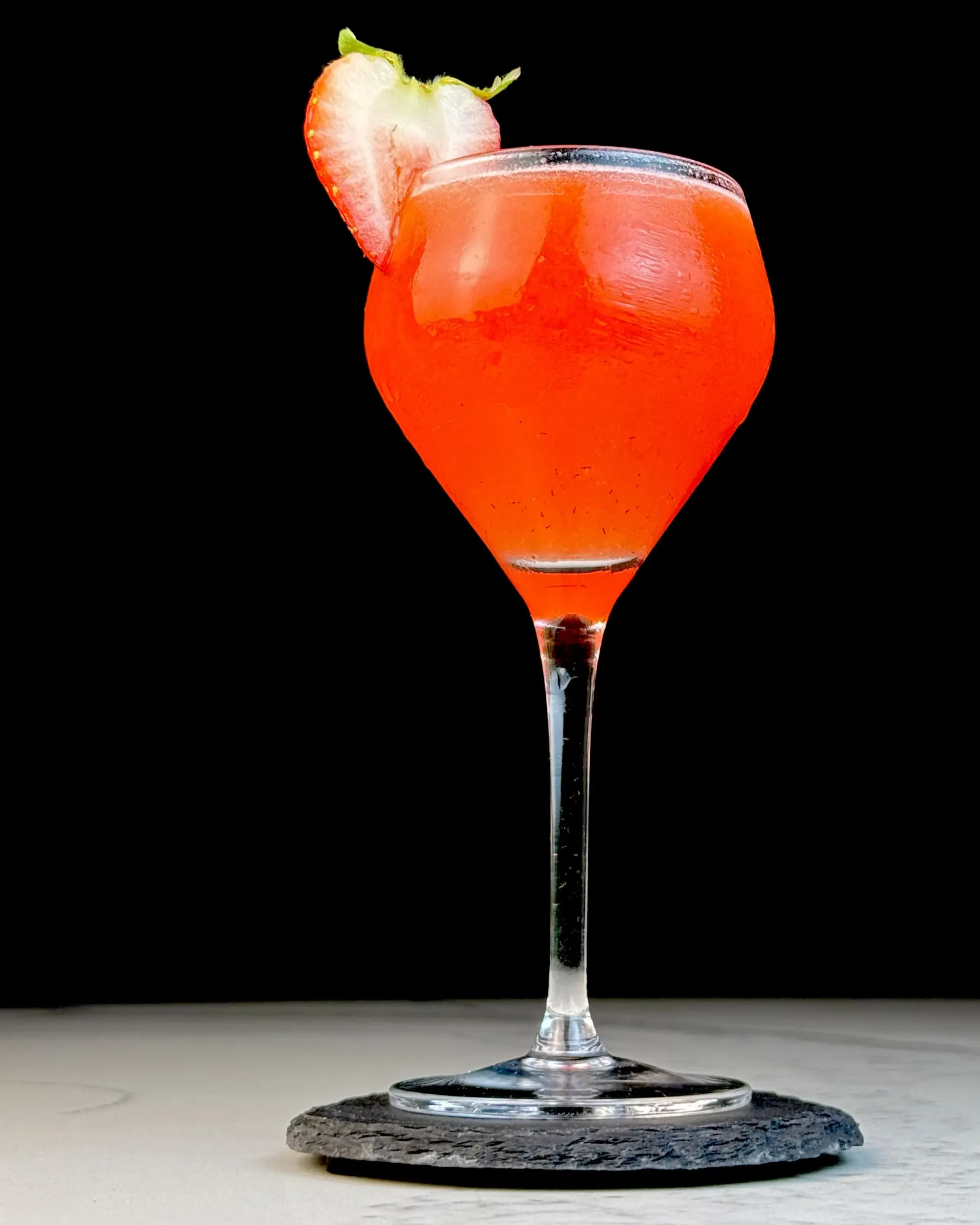 Skinny SB Daiquiri, a strawberry daiquiri with white rum, fresh berries, and a lean, fruit-forward balance