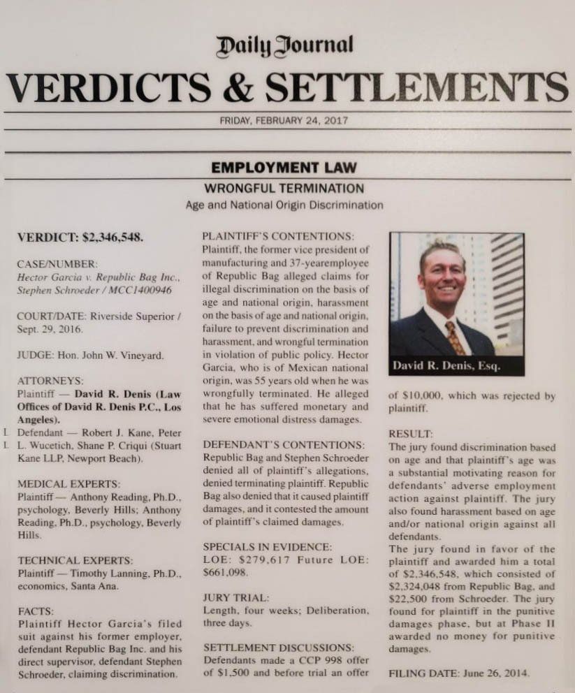 A newspaper clipping of a successful wrongful discrimination case.