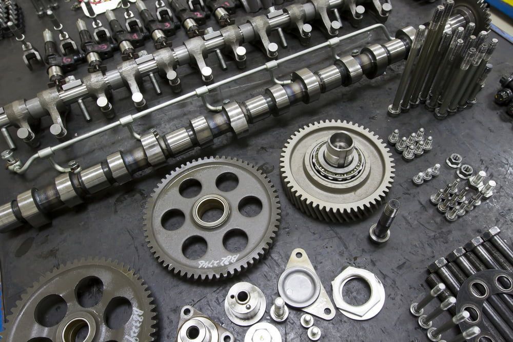 Engine Parts Laid Out on a Dark Surface — Crypto Parts In  Tuggerah, NSW
