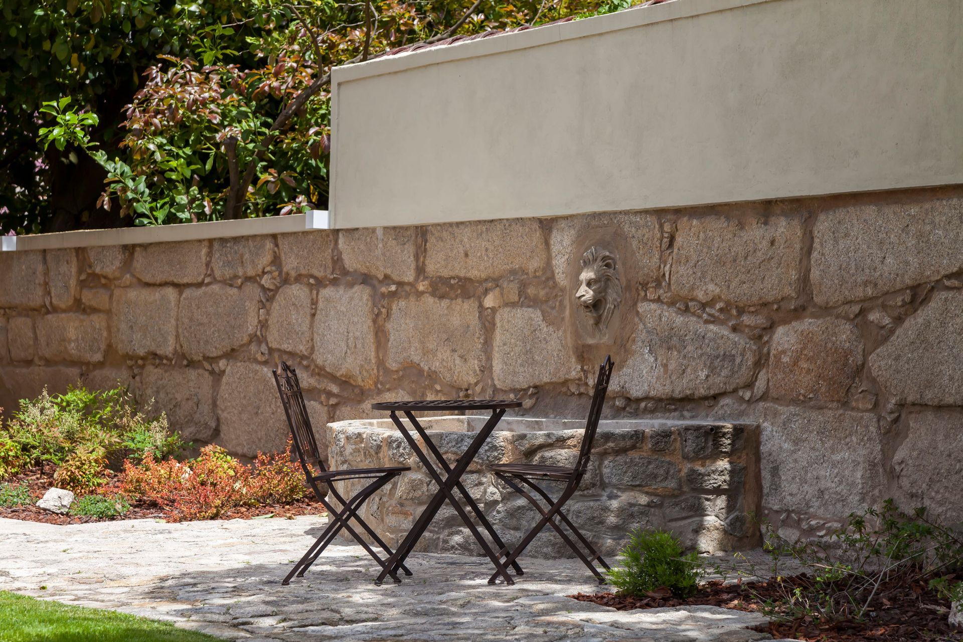 Stone Fountain in the garden of Casa Kala, Unique Boutique Hotel in Porto Portugal