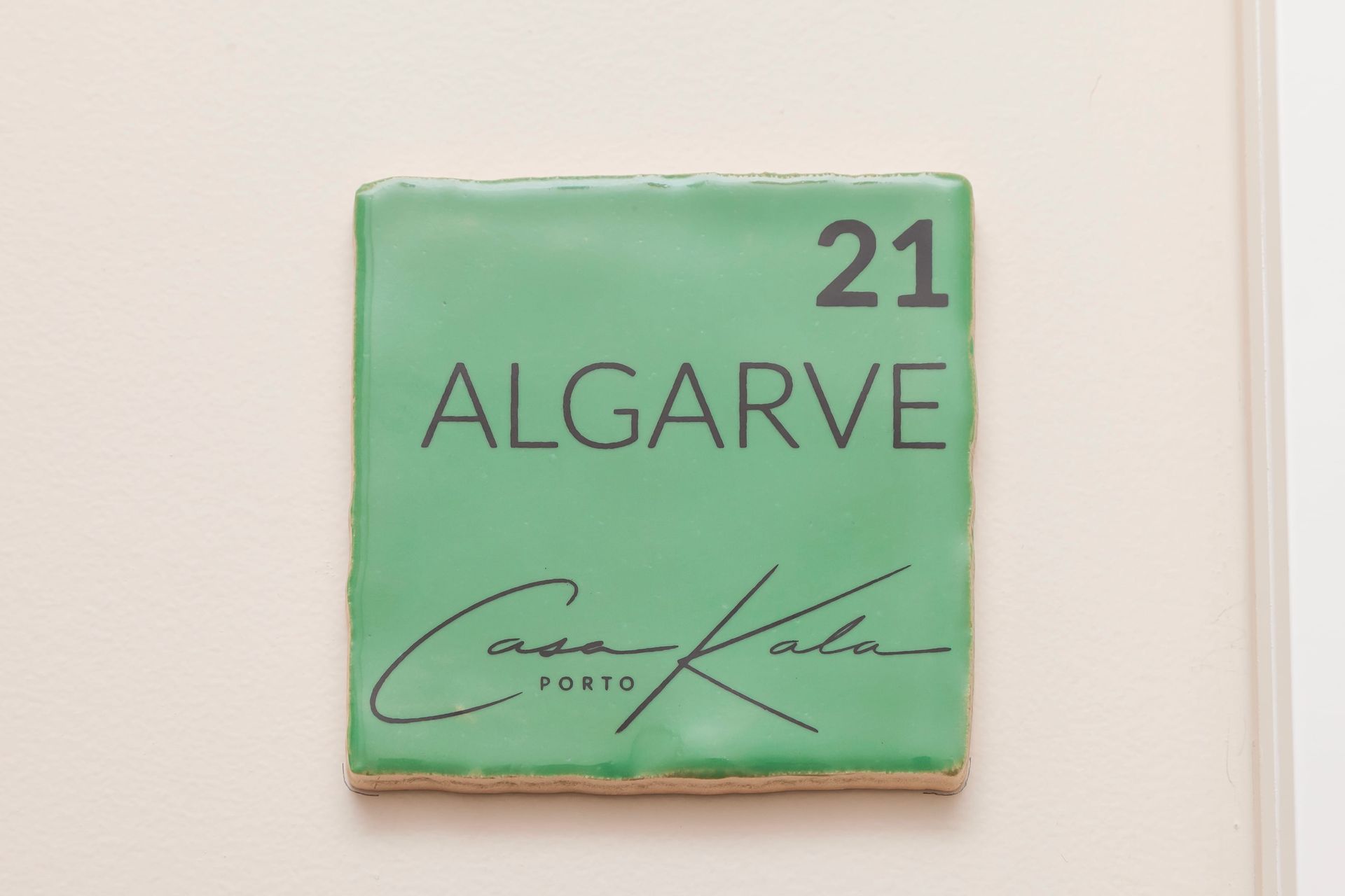 Green tile sign for