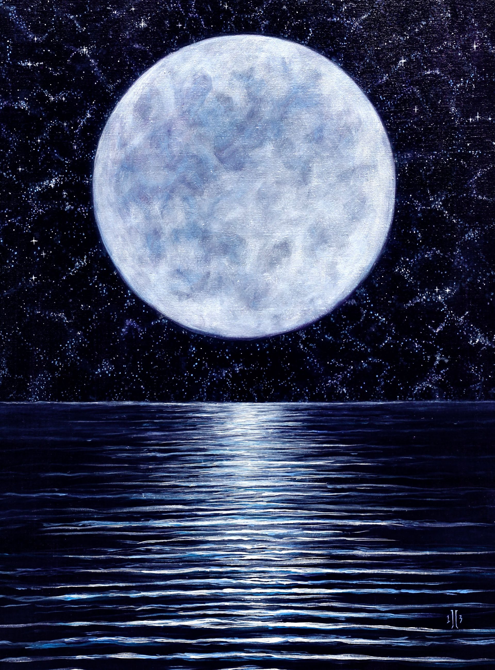 Full moon over a dark ocean, with bright reflections on rippling water at night