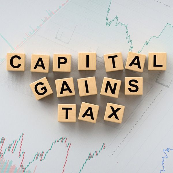 Individual block letters spelling out capital gains tax across three rows.