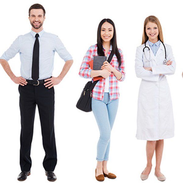 A man and two women dressed for work