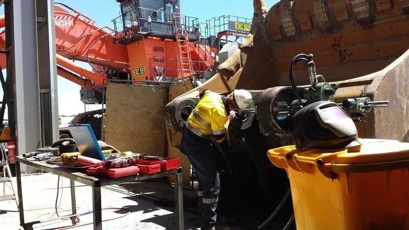 Man Working On Machine — Line Boring in Tamworth, NSW