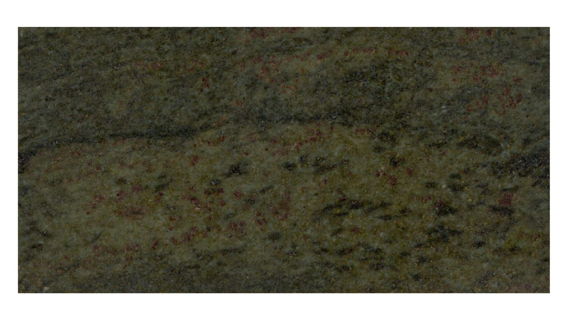 A close-up of dark green granite stone with speckled textures of brown, black, and beige mineral deposits.