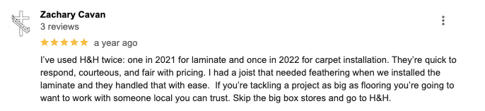 A blurred image of a review on a website.