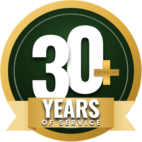 30+ years of service emblem in green and gold, with a ribbon banner
