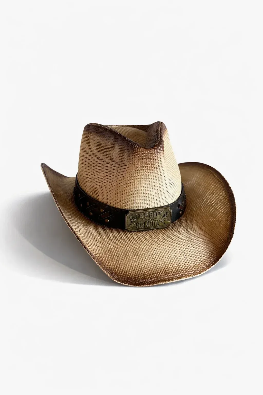 Brown straw cowboy hat with a black band on a white background