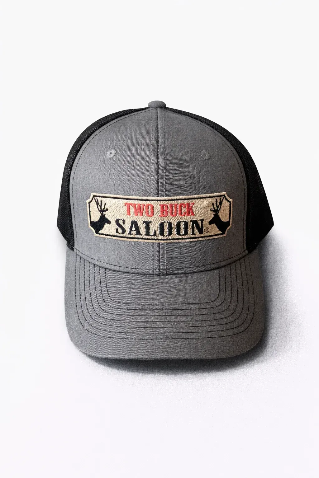 Gray trucker hat with a front patch reading “Two Peck Saloon”