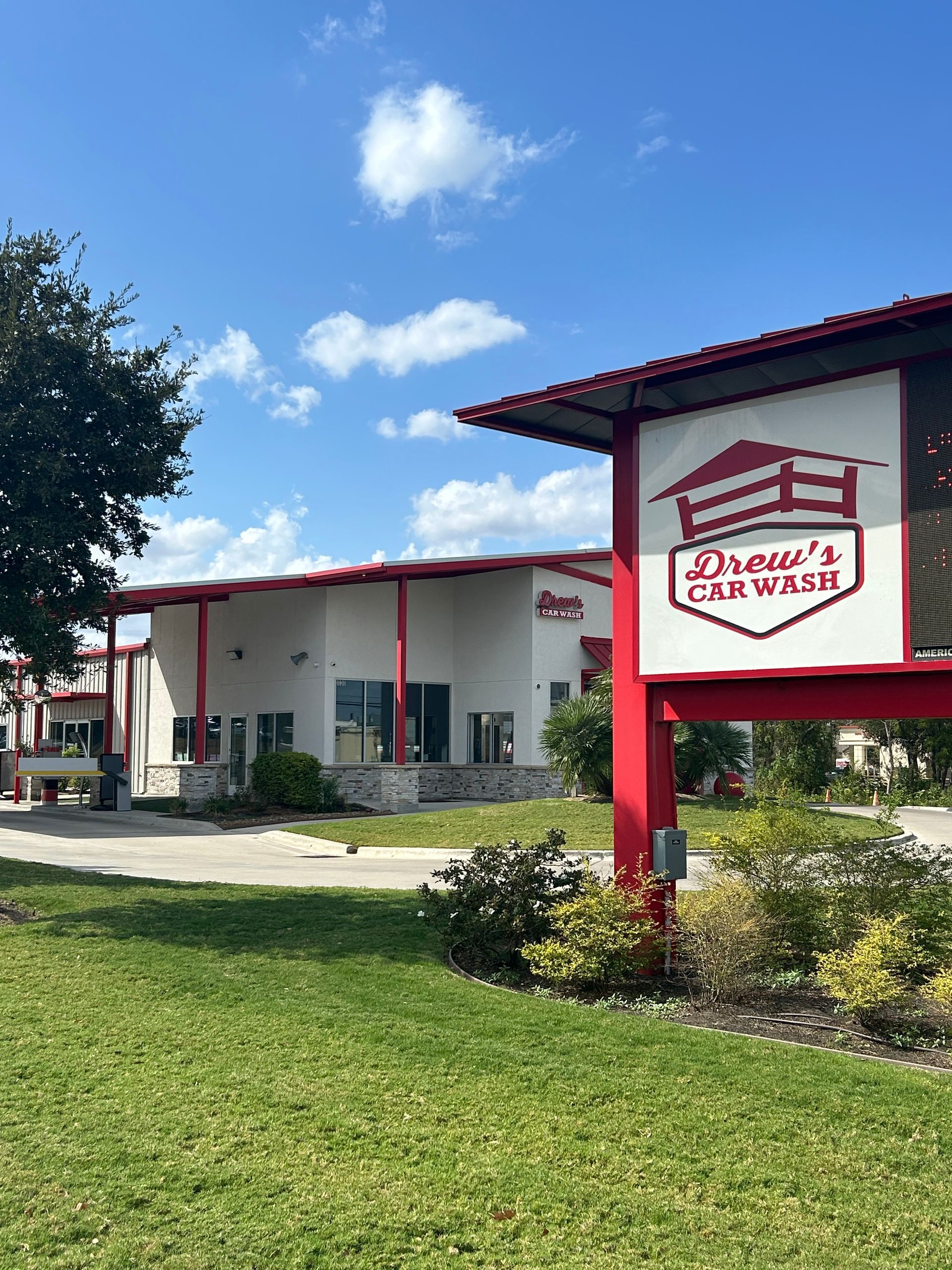 The Drew's Car Wash location exterior and sign in Bryan and College Station, Texas.