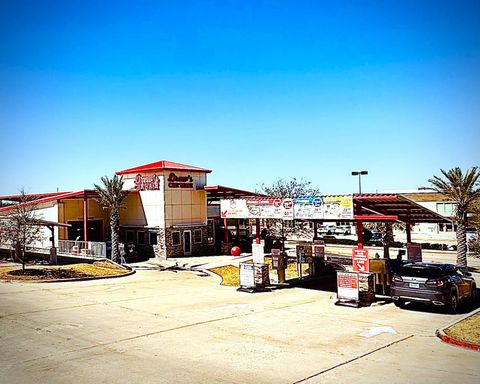 A car wash with a truck parked in front of it