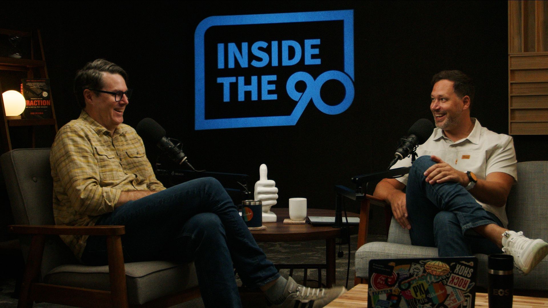 Inside the 90 podcast episode still showing hosts discussing abundance mindset in leadership