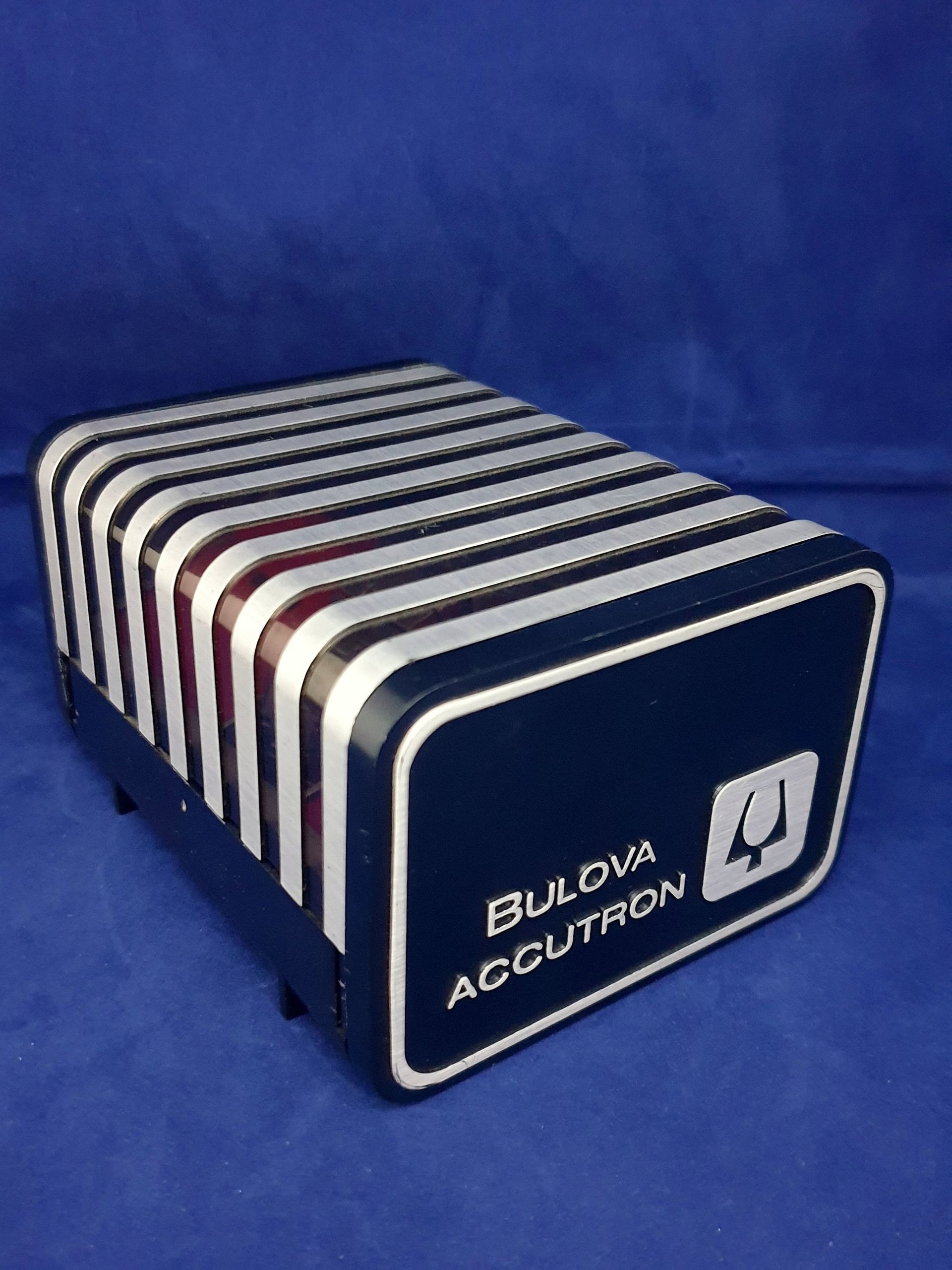 Bulova Accutron striped vintage box on a blue background