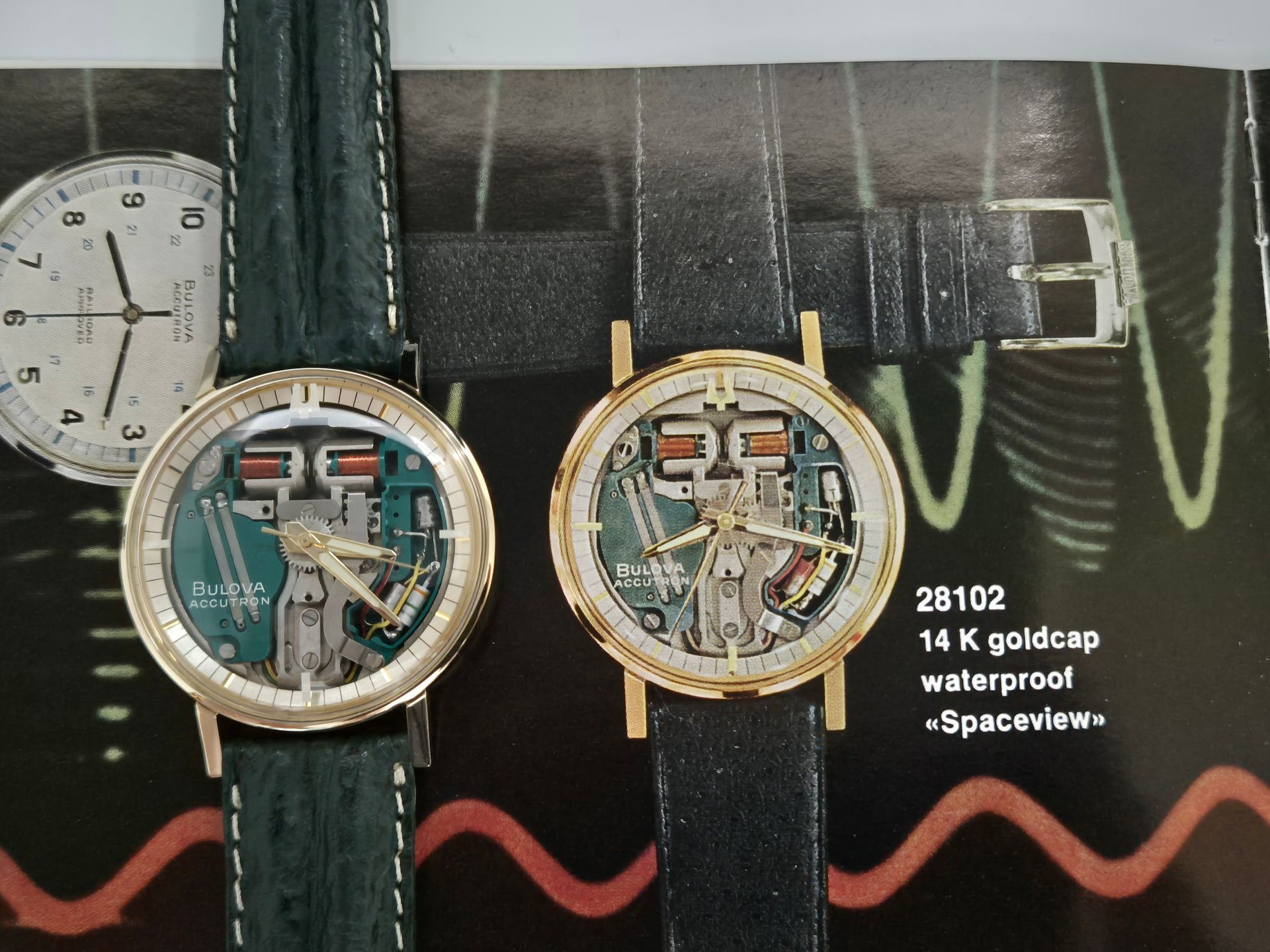 Two skeleton wristwatches, one silver and one gold, displayed on a product box background.
