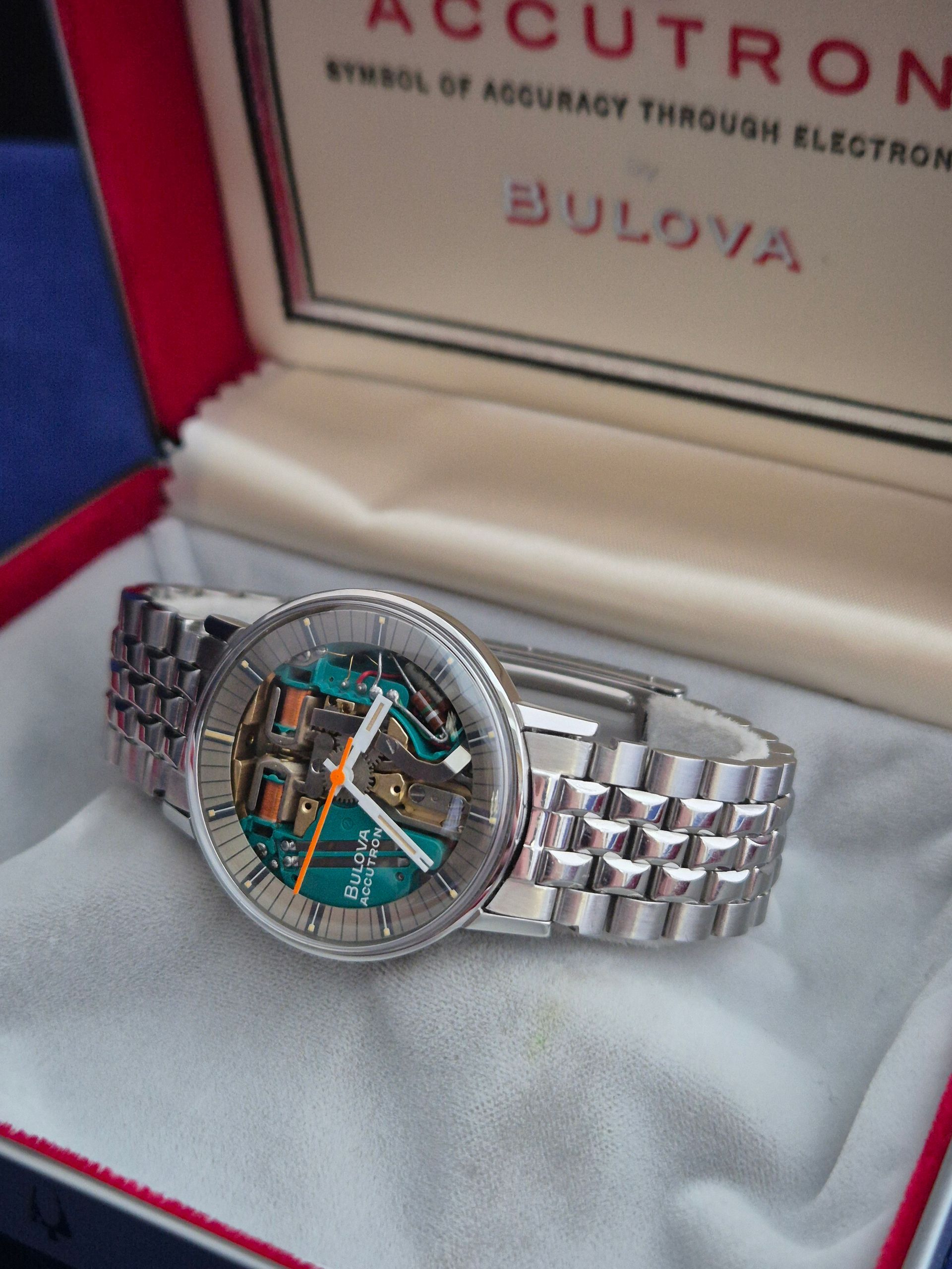 Bulova Accutron watch with silver band in red-lined presentation box
