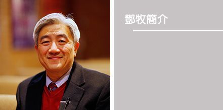 A man in a suit smiles. The text